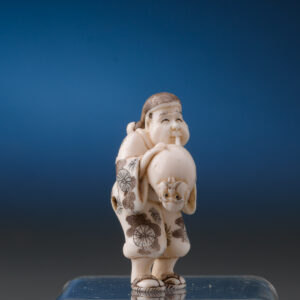 Netsuke Man Inflating